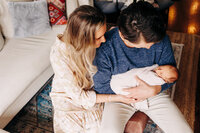 newborn photography with a couple and their baby girl