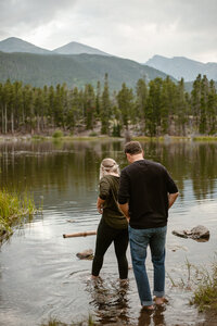 photo of bride standing before large rock formation taken by Adventure elopement photographer in telluride