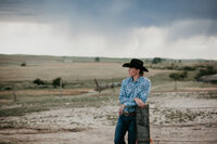 Wedding photo session on a client’s land in Circle, MT, featuring intimate moments of the couple amidst Montana's stunning open fields. Ideal for couples seeking a unique, rural setting for their wedding day.

