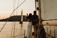 bride and groom on sail boat