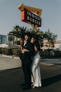 bride hugging groom