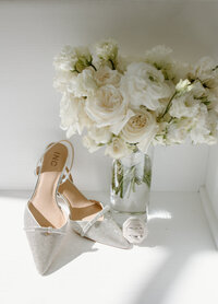 Brides bouquet, shoes, and wedding ring details