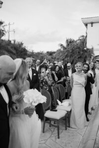 bride facing away from the camera in her dress and looking over her shoulder