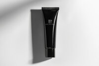 Black tube of Beard One Products facial moisturizer on a white background