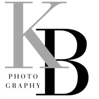 logo of a denver wedding photographer KB Radiant Photography with pink lettering and a yellow flower in the background