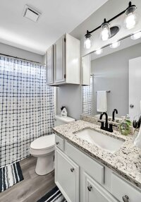 Upstairs bathroom vanity in this Sleeper sofa for two with Smart TV in this 3-bedroom, 2.5 bathroom lake house with incredible view of Lake Belton located at Morgan's Point, near Rogers Park and Temple Lake Park.