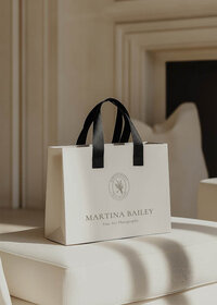 Luxury shopping bag mockup featuring the Martina Bailey Fine Art Photography logo—part of an elegant Canva brand kit for wedding photographers, showcasing romantic typography and timeless branding design.