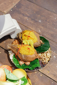 A plate of food sitting on a wooden table 