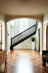 A historic Hingham home featuring modern furniture and custom design by Boston area interior designers, blending tradition with contemporary style.