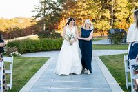 Mom and daughter walking down aisle at Waverly Oaks in Plymouth MA