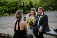 bride and groom with wedding rings