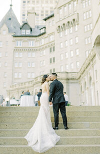 Chic all-white wedding at the Fairmont Macdonald, captured by Minted Photography, featured on the Brontë Bride Blog.