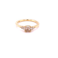 yellow gold ring with radiant cut champagne and small white diamonds