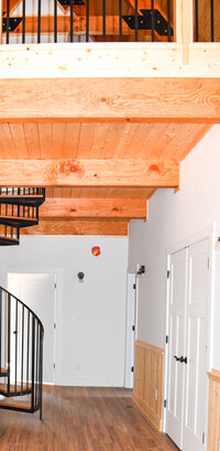 Explore stunning timberframe custom homes built by Ryan Noble Construction. Featuring exposed wooden beams, vaulted ceilings, and rustic charm, each home is a perfect blend of craftsmanship and natural beauty. Discover how timberframe construction adds warmth and elegance to your dream home