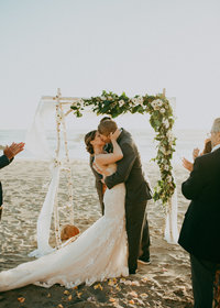 bride and groom kissing