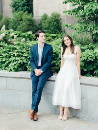 Couple leaning against a wall taken by baltimore wedding photographer