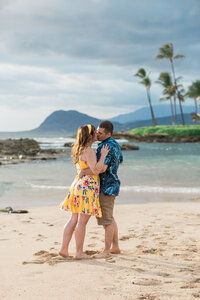 Couple kissing at the beach