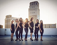 Hair and makeup team photo on rooftop in detroit