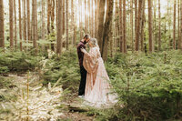 couple embracing in the Forrest