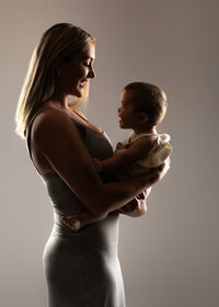 Syracuse photographer, newborn, baby, props, newborn photoshoot, photography, belly, backdrop, studio, rim lit