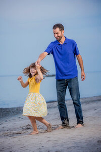 Eric Smyklo with daughter during family photo session.