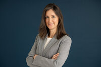 LinkedIn-ready professional headshot of a Northville business owner, showcasing confidence and professionalism in a studio setting.
