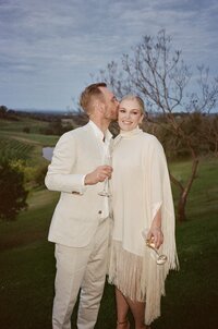 Bride and groom kissing at their hunter valley wedding