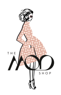 A logo featuring the words "The Mod Shop" superimposed on an illustration of a woman wearing a pink and white patterned dress.