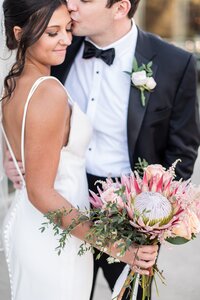 Bride and groom walk up memorial steps at their DC wedding