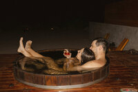 couple sitting in a hot tub together