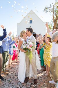 bride and groom kissing