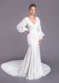 Full bishop fit and flare wedding dress with long sleeves