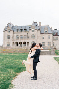 Newport Wedding Photographer | Rhode Island Caprio Captured Photography | Couple holding hands while sitting at a sailboat