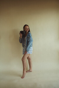 Portrait of Sarah Todd, an Ontario-based photographer, capturing moments that tell stories.