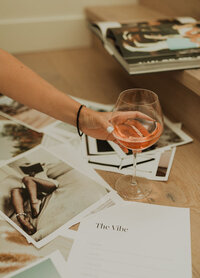 An open magazine with black and white editorial photos of women