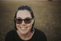Smiling self portrait of birth photographer in Tifton