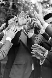 Scottsdale-Wedding-Photographer-and-Videographer-Private-Residence-Groomsmen-huddle-release-HuffoWed-1226