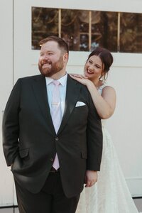 Bride and groom pose for romantic portraits in Larkspur Colorado