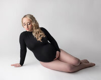 Cleveland, Akron & Canton Maternity in studio with white backdrop.