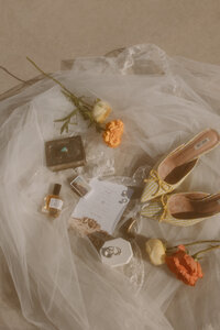 film inspired flat lay. Desert details with unique wedding shoes