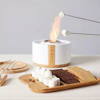 White and wood ceramic s'mores-making kit. 
