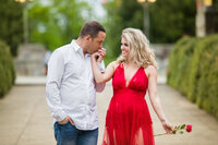 Engaged couple striking a pretty and romantic pose, perfect for capturing love and connection in an elegant frame.