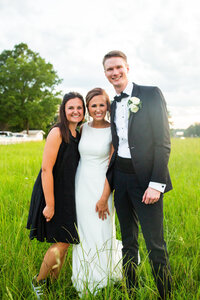Eleanor Stenner with bride and groom at Birmingham wedding 