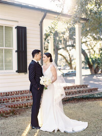 Bride & Groom pose for photos in Charleston