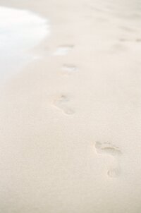 footsteps in the sand on Maui