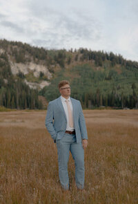 Groom portrait taken in Idaho Falls, Idaho. With one hand in his pocket, the groom looks off to the side.
