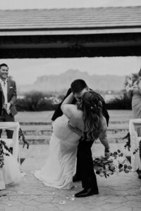 middle of the aisle ceremony kissing dip