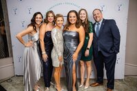 Friends selling Cocktails and Chemo tshirts at an event