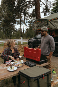adventure travel couple cooking in oregon