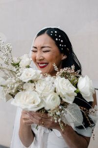 bride stands in opening